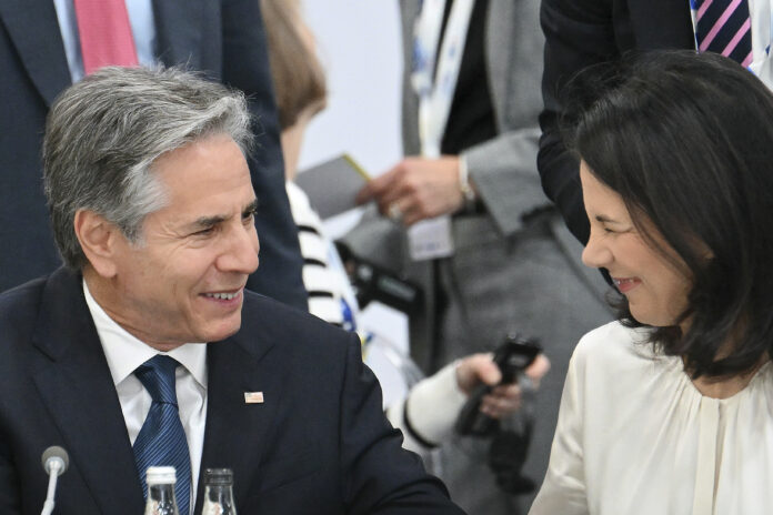 State Antony Blinken, left, speaks to Germany's Minister for Foreign Affairs