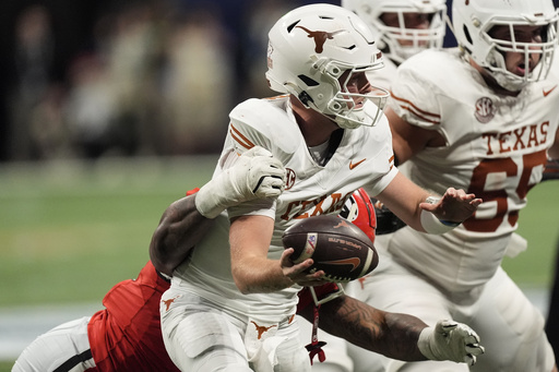 Texas experiences disappointment from SEC title loss but remains hopeful for a national championship victory.