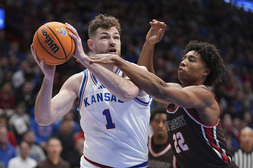 Mayo and Dickinson lead No. 8 Kansas to a decisive 87-53 victory against Brown.