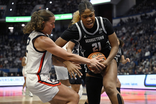 Paige Bueckers and Sarah Strong guide No. 2 UConn to victory over Georgetown in their Big East debut.