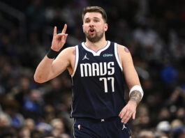 Dallas Mavericks guard Luka Doncic (77) gestures during the second half of an NBA basketball game against the Washington Wizards, Thursday, Dec. 5, 2024, in Washington. The Mavericks won 137-101. (AP Photo/Nick Wass)