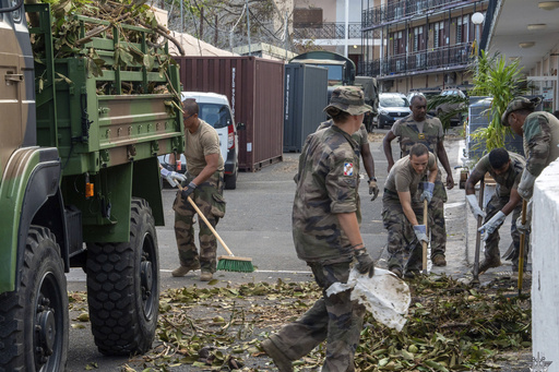 Relatives rush to assist following a lethal cyclone that struck Mayotte, a French territory near Africa.