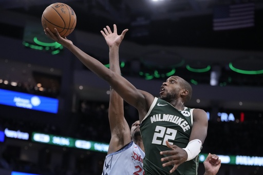 Portis nets career-best 34 points while stepping in for injured Antetokounmpo, leading Bucks to 112-101 victory over Wizards.