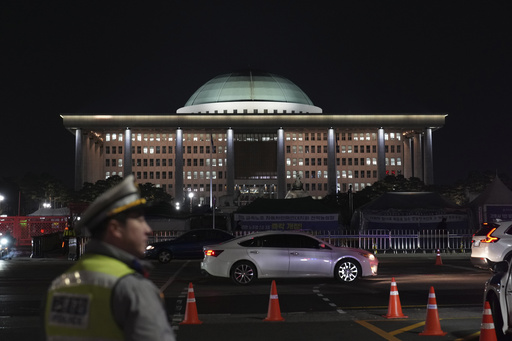 Former South Korean defense minister officially detained for short-lived martial law enforcement.