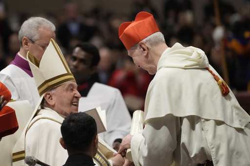 Pope Francis leads ceremony for new cardinals sporting a noticeable bruise on his chin