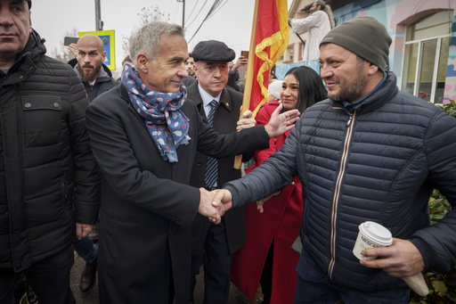 Romania’s far-right presidential hopeful criticizes the voided ballot at a sealed polling place