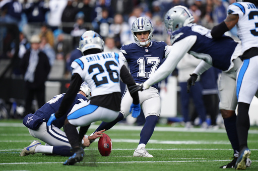 Rush records personal-best 3 touchdown passes as Cowboys capitalize on 4 turnovers to defeat Panthers 30-14