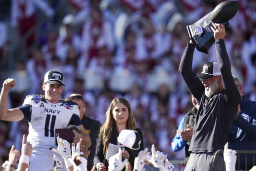 Horvath’s 95-yard touchdown run leads Navy to victory over Oklahoma with a crucial stop on a two-point conversion in the Armed Forces Bowl.