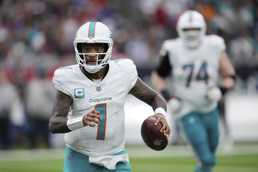 Dolphins quarterback Tua Tagovailoa sidelined as Miami battles Browns to sustain playoff aspirations.