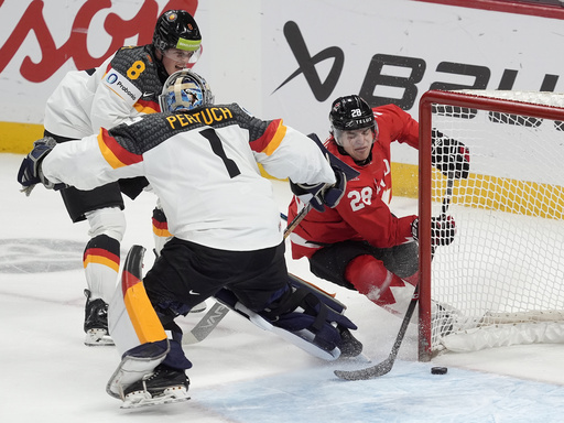 Finland edges out US 4-3 in overtime at world junior hockey; Canada bounces back from defeat to beat Germany 3-0