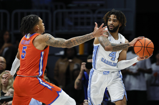 Richard’s 22 points leads No. 7 Florida to a 90-84 victory over UNC, staying perfect this season despite a late rally.