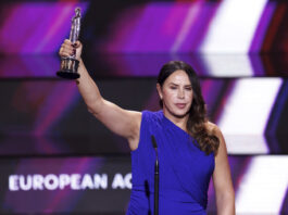 Karla Sofia Gascon, of Spain, winner of the European Actress category for "Emilia Perez”, accepts her award during the European Film Awards gala at the Culture and Convention Center KKL in Lucerne, Switzerland, Saturday, Dec. 7, 2024. (Michael Buholzer/Keystone via AP)