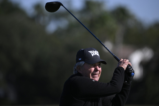 Tiger Woods and his son Charlie tie for the top spot at the PNC Championship in Orlando