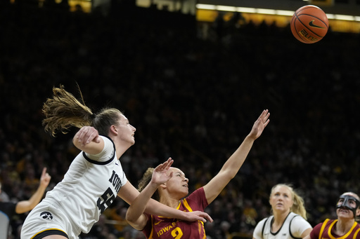 Ranked 21st Iowa women’s team comes from behind in the final quarter to defeat No. 18 Iowa State 75-69.