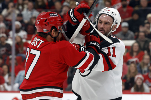 Roslovic nets two as Hurricanes erupt for four goals in third period to secure 5-2 victory against Devils.