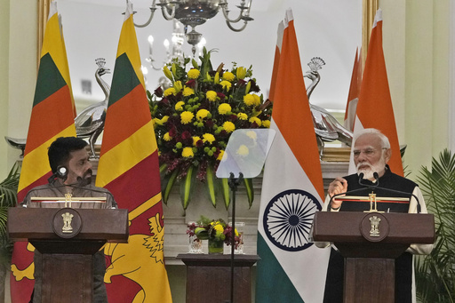 Sri Lanka’s leader meets Modi during his inaugural international trip to India.