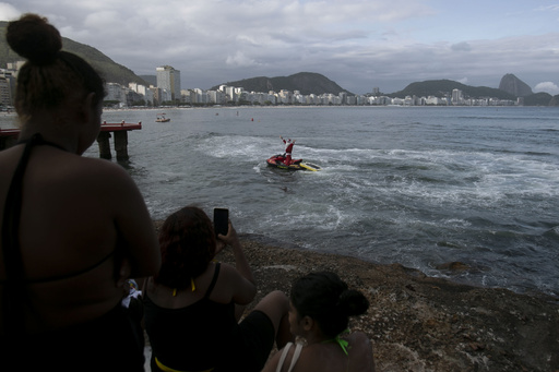 Brazilian Santa trades sleigh for Jet Ski to bring gifts and happiness to children with disabilities in Rio