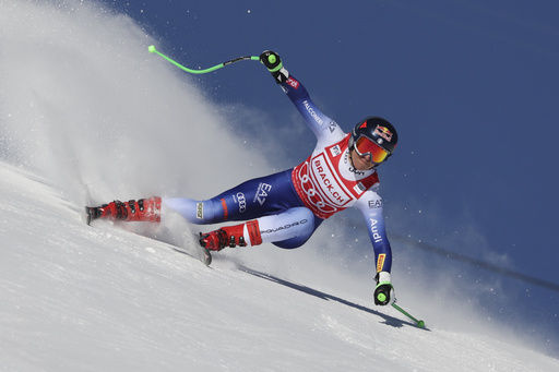 Huetter triumphs over Gut-Behrami to claim super-G victory in St. Moritz, stunning the Swiss audience.