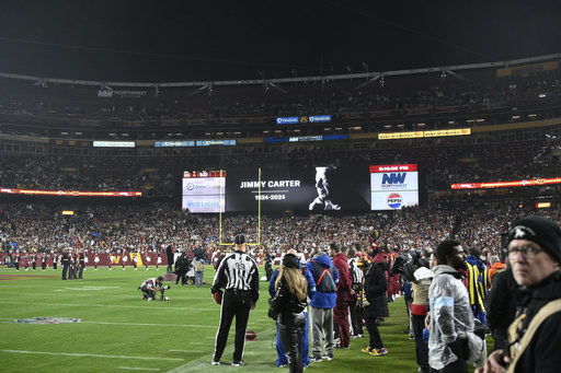 Falcons-Commanders game observes moment of silence for ex-President Jimmy Carter