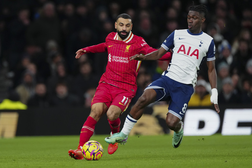 Salah breaks a new scoring record, leading Liverpool to triumph against Tottenham