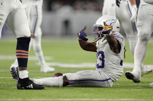 Vikings secure seventh consecutive victory, tying for NFC North top spot with a decisive 30-12 rout of struggling Bears.