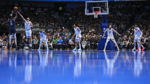 Doncic scores 37 points and grabs 12 rebounds as Mavericks surge past Grizzlies 121-116.