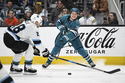 Keller nets late power-play goal, securing 4-3 victory for Utah over the Sharks.