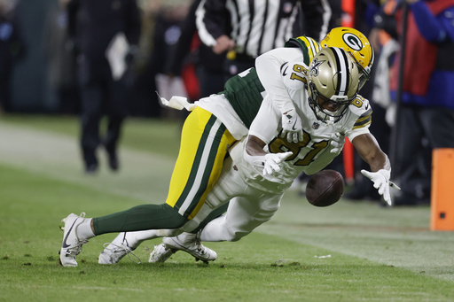 Packers secure playoff spot by shutting out Saints 34-0, marking the NFL’s first shutout of the season.