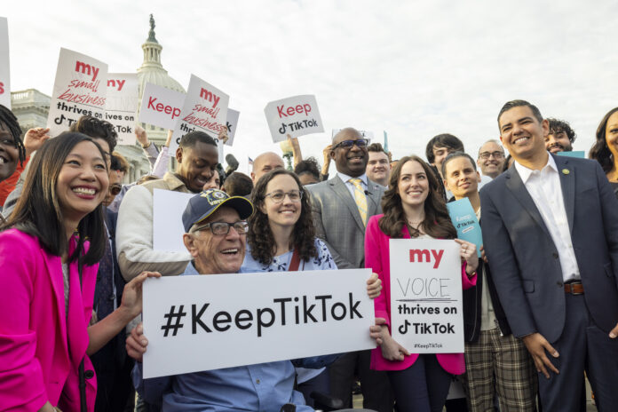 WASHINGTON DC, UNITED STATES - MARCH 22: U.S. representative for New York's 16th congressional district Jamaal Bowman participates as TikTok content creators gather outside the Capitol to voice their opposition to a potential ban on the app, highlighting the platform's impact on their livelihoods and communities in Washington DC, United States on March 22, 2023. Bowman emphasized the platform's role in promoting free speech and fostering community. (Photo by Nathan Posner/Anadolu Agency via Getty Images)