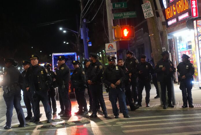 NEW YORK, UNITED STATES - NOVEMBER 19: Officers from NYPD take security measures in the area as pro-Palestinians gather to protest the event offering prosperity in 'Anglo Neighborhoods' of Palestine in Flatbush, a neighborhood in the New York City borough of Brooklyn, United States on November 19, 2024. (Photo by Selcuk Acar /Anadolu via Getty Images)