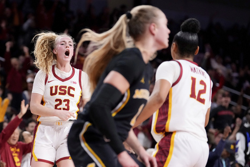 JuJu Watkins’ 31 points lead No. 4 Southern California to a 78-58 victory against No. 23 Michigan.