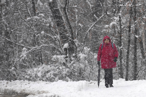 Snowstorm in the Balkans knocks out power to tens of thousands and disrupts traffic.