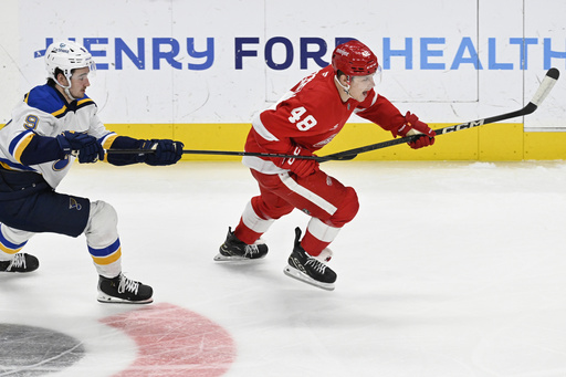 Holloway nets first career hat trick as Blues shut out Red Wings 4-0