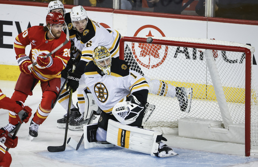 Pastrnak nets overtime goal, leading Bruins to comeback victory over Flames 4-3