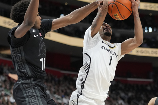 Xavier Booker sets personal record with 18 points as No. 20 Michigan State triumphs over Oakland 77-58, securing their fourth consecutive victory.