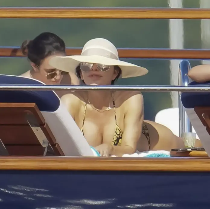 Lauren Sánchez sunbathing aboard Jeff Bezos’ yacht (Photo: BACKGRID)