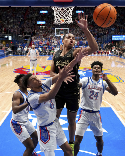 Zeke Mayo tallies 24 points and seals victory with free throws as No. 11 Jayhawks come back to defeat UCF, 91-87