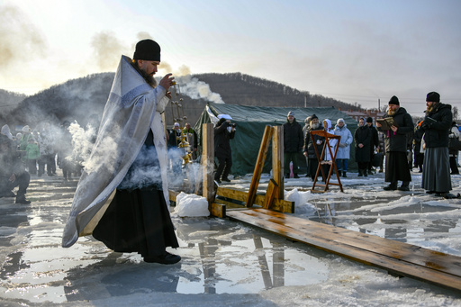 Unseasonably high temperatures endanger Epiphany ice plunges for Orthodox Christians in Russia.