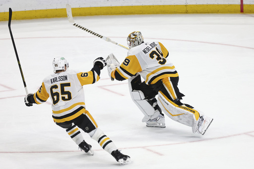 Nedeljkovic of the Penguins sets NHL record as the first goaltender to achieve both a goal and an assist in a single game.