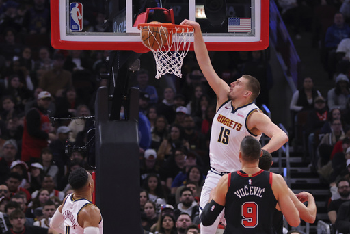 Vucevic guides Bulls to 129-121 win over Jokic and the Nuggets