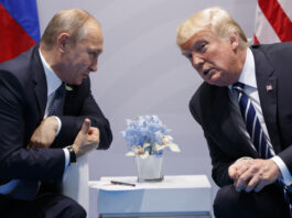 FILE - U.S. President Donald Trump meets with Russian President Vladimir Putin at the G-20 Summit in Hamburg, Germany, on July 7, 2017. (AP Photo/Evan Vucci, File)