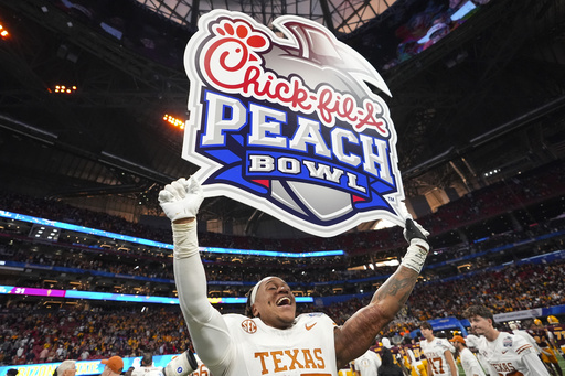 Texas narrowly escapes significant upset, defeating Arizona State 39-31 in a double overtime thriller at the Peach Bowl.