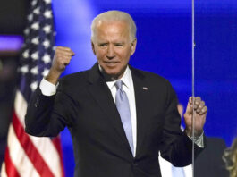 FILE - President-elect Joe Biden gestures to supporters Nov. 7, 2020, in Wilmington, Del. (AP Photo/Andrew Harnik, File)