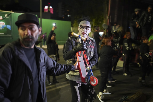 Punks hand out toys to underprivileged kids for Three Kings Day celebration in Mexico City