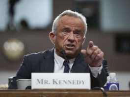 Robert F. Kennedy Jr., President Donald Trump's choice to be Secretary of Health and Human Services, appears before the Senate Finance Committee for his confirmation hearing, at the Capitol in Washington, Wednesday, Jan. 29, 2025. (AP Photo/Ben Curtis)