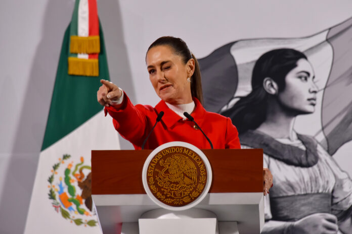 MEXICO CITY, MEXICO - DECEMBER 27: President of Mexico Claudia Sheinbaum Pardo gestures during the daily morning briefing at the National Palace on December 27, 2024 in Mexico City, Mexico. (Photo by Xavier Martinez/ObturadorMX/Getty Images)