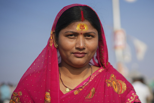 Vibrant hues on foreheads represent a significant expression of Hinduism during India’s Maha Kumbh festival.