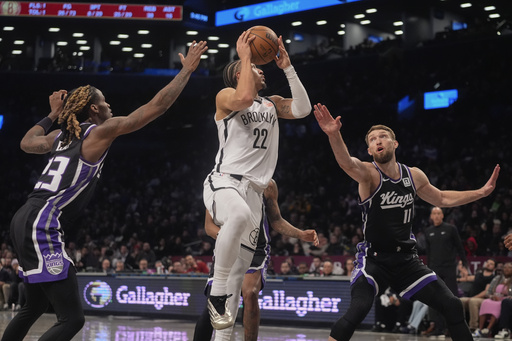 Sabonis records 22 boards in another triple-double, leading Kings to 110-96 victory over Nets