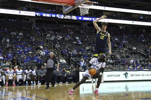 Kam Jones tallies 19 points as No. 10 Marquette defeats Seton Hall 76-59.