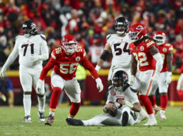 KANSAS CITY, MISSOURI - JANUARY 18: George Karlaftis #56 of the Kansas City Chiefs celebrates after sacking C.J. Stroud #7 of the Houston Texans during the second half of the AFC Divisional playoff game at GEHA Field at Arrowhead Stadium on January 18, 2025 in Kansas City, Missouri. (Photo by Aaron M. Sprecher/Getty Images)